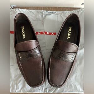 Prada Men's Dark Brown Leather driving Loafers with a crocodile embossed detail.